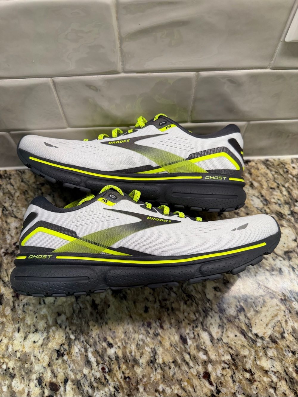 Brooks gray running shoes with neon yellow accents - Picture 4 of 6